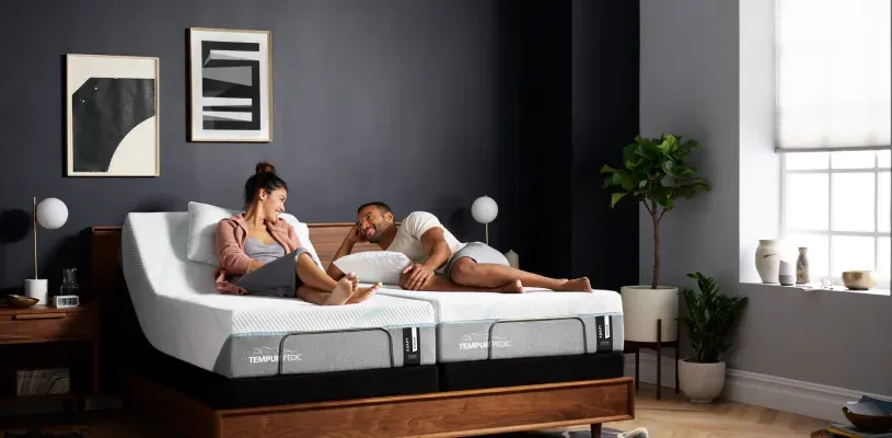 man and women laying in bed